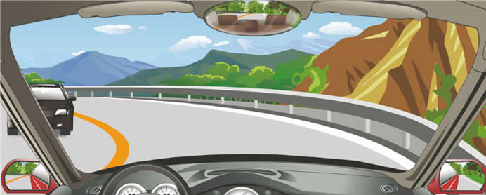 驾驶机动车在这种条件的弯道处怎样转弯最安全?